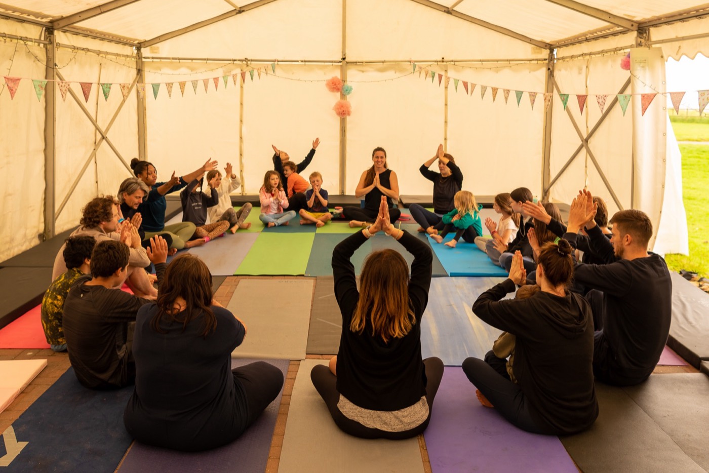 Adults and children sharing an embodied group practice