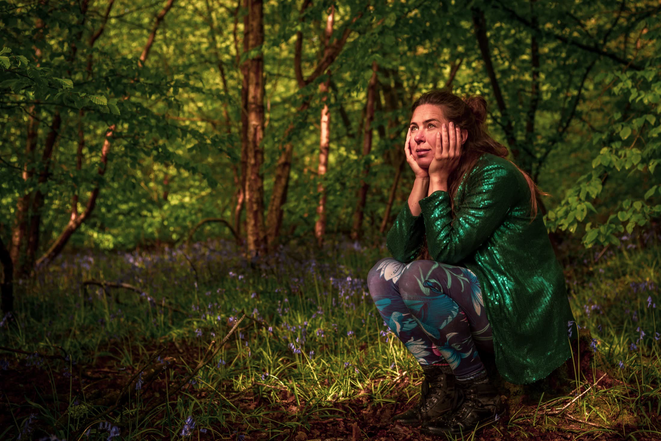 Francesca pausing in a quiet woodland setting