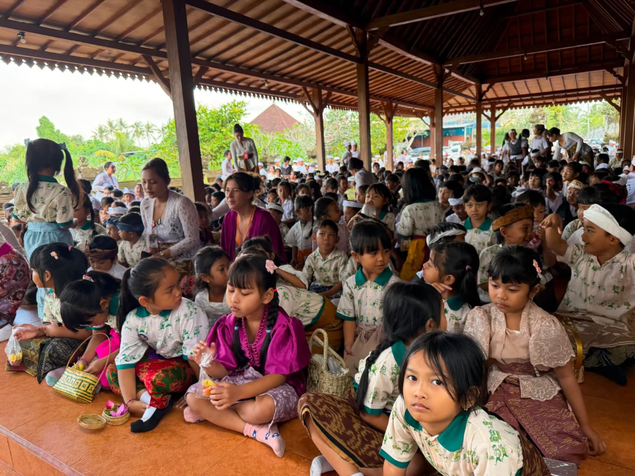 Children gathered in an international community setting