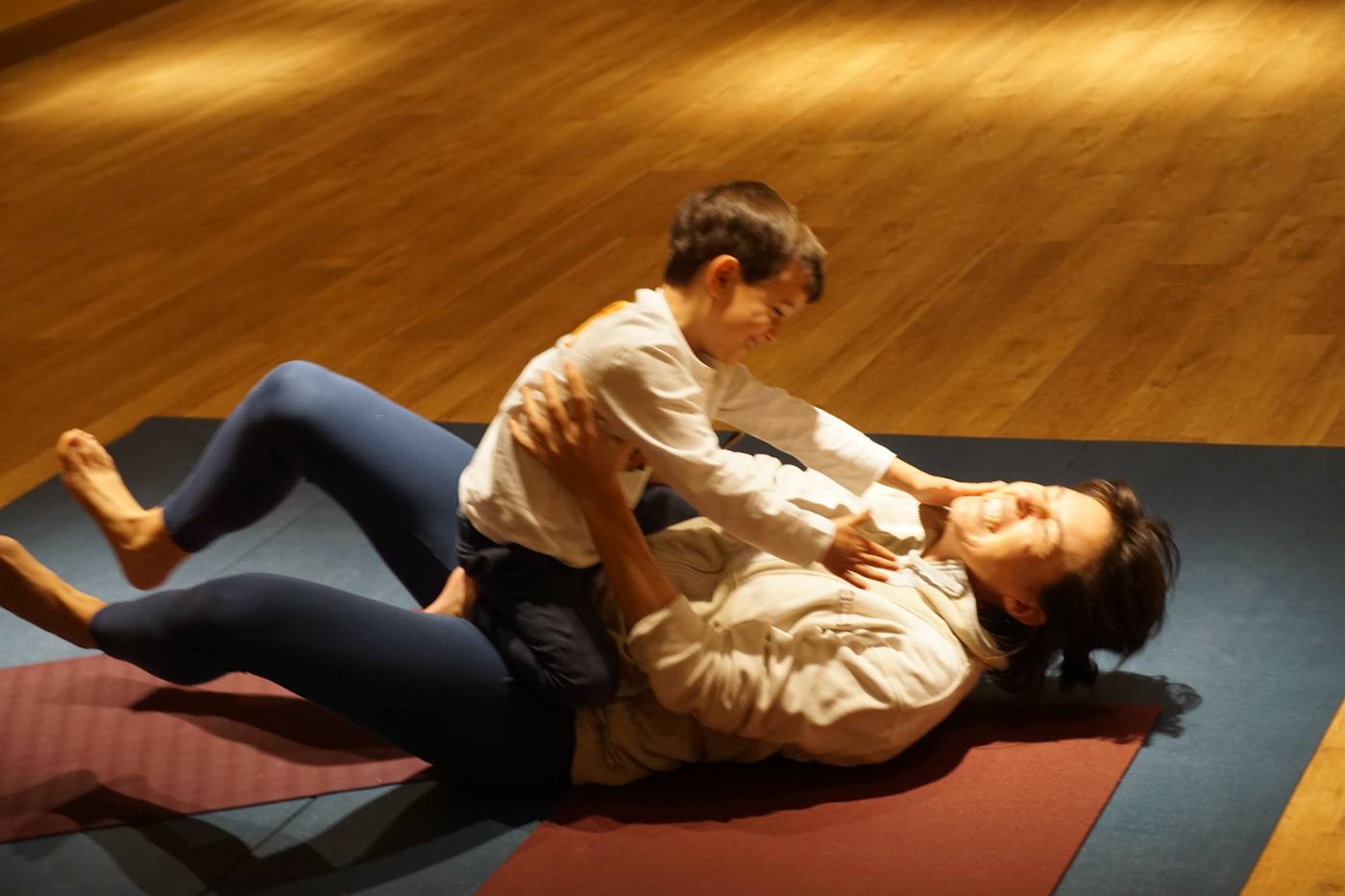 Parent and child playing and in contact together